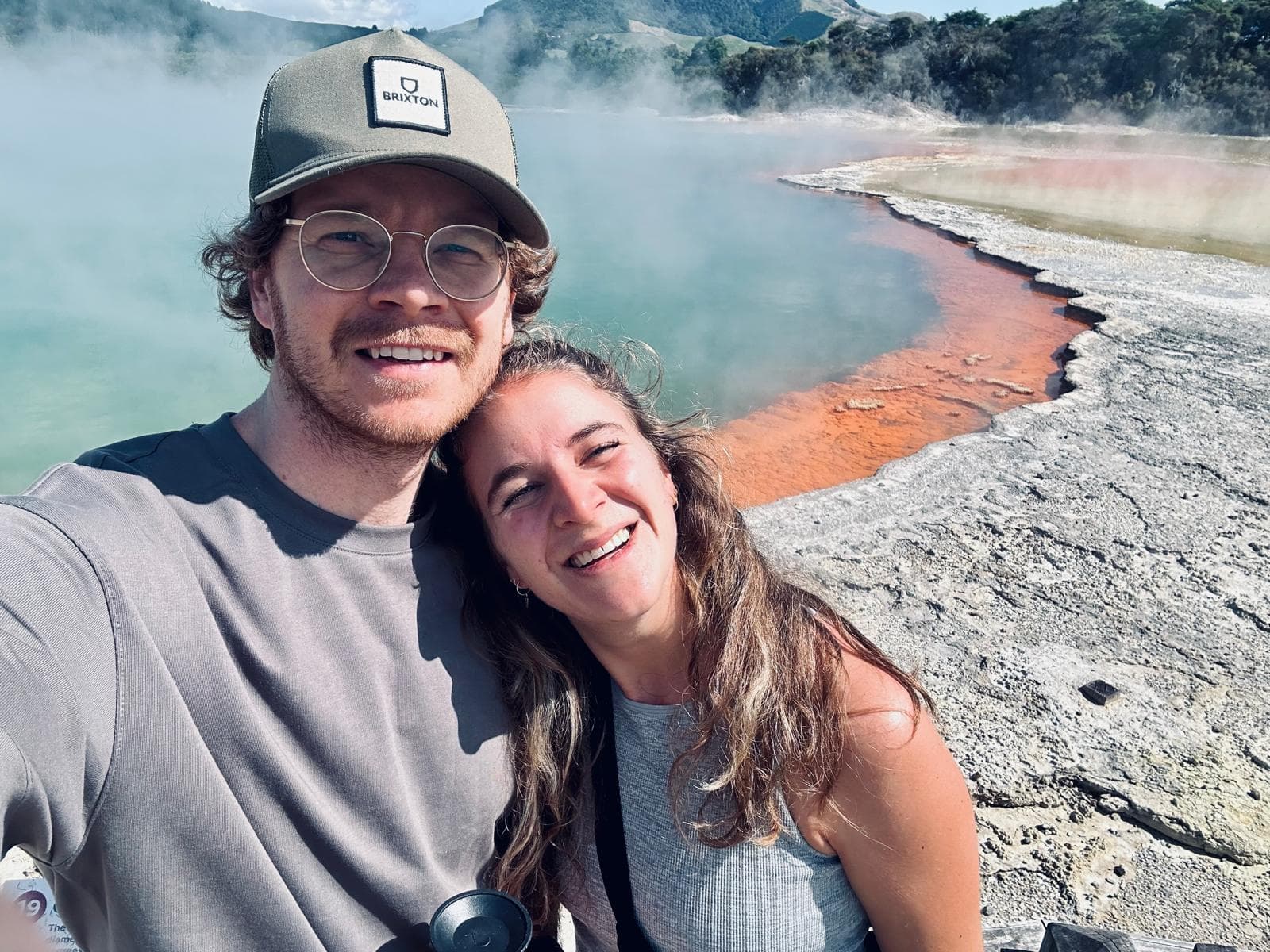 Lauran and Nikki, the family behind JustGoodCampers, at a New Zealand thermal pool
